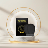 Vingt-Neuf Luxury Exfoliating Mitt body exfoliation glove with premium packaging on display